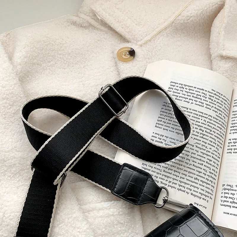 Vintage-style PU leather crossbody bag in black, shown with dimensions for scale.