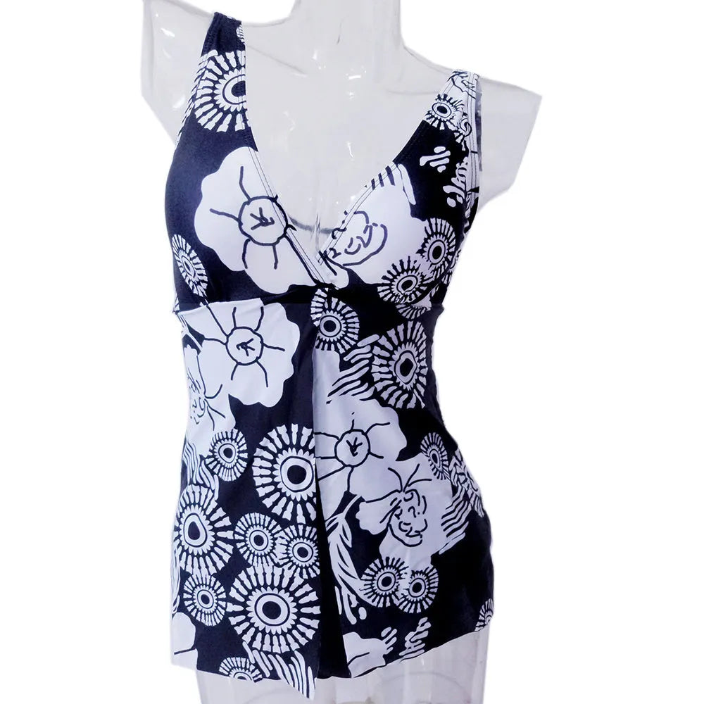 Plus-size one-piece swimsuit in black with floral print and soft bust support, front view