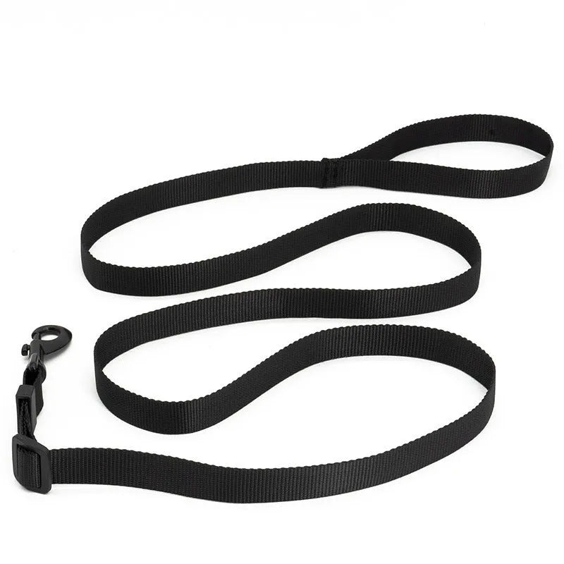 Escape proof cat vest harness in black with reflective trim and car seat belt adapter leash