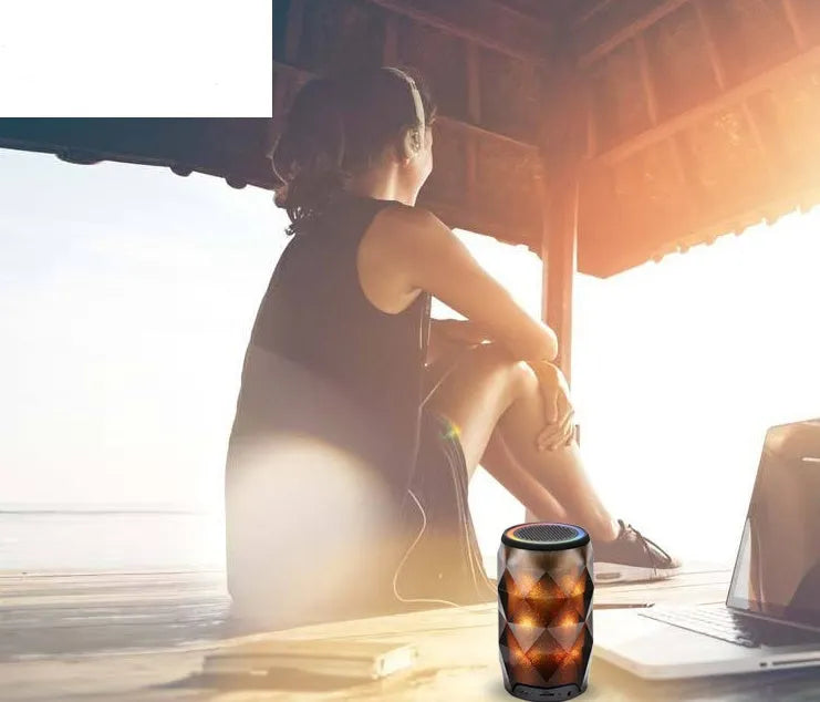 Black crystal diamond-cut Coke can shaped lantern speaker with colourful LED lighting effects