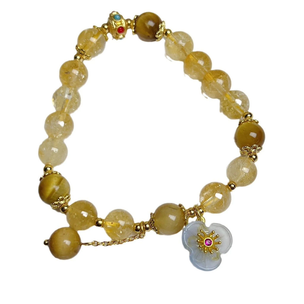 Women's citrine bracelet with floral tassel design, handcrafted crystal jewellery