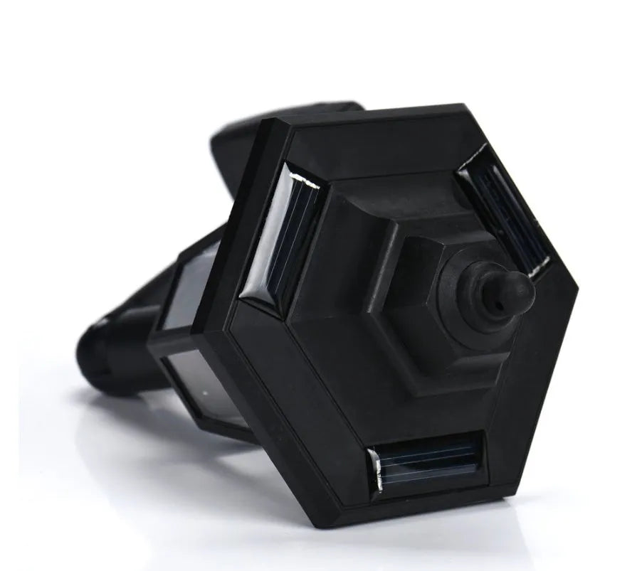 Black hexagonal solar wall light with solar panel for outdoor garden installation