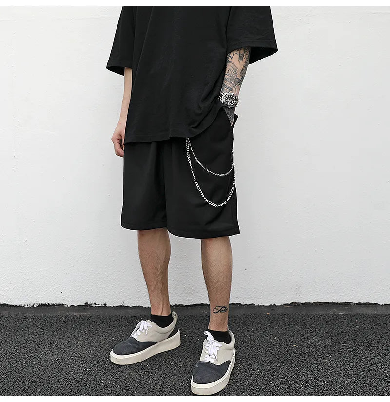 Black cotton trouser chain suit shorts for men with secure key chain, side view