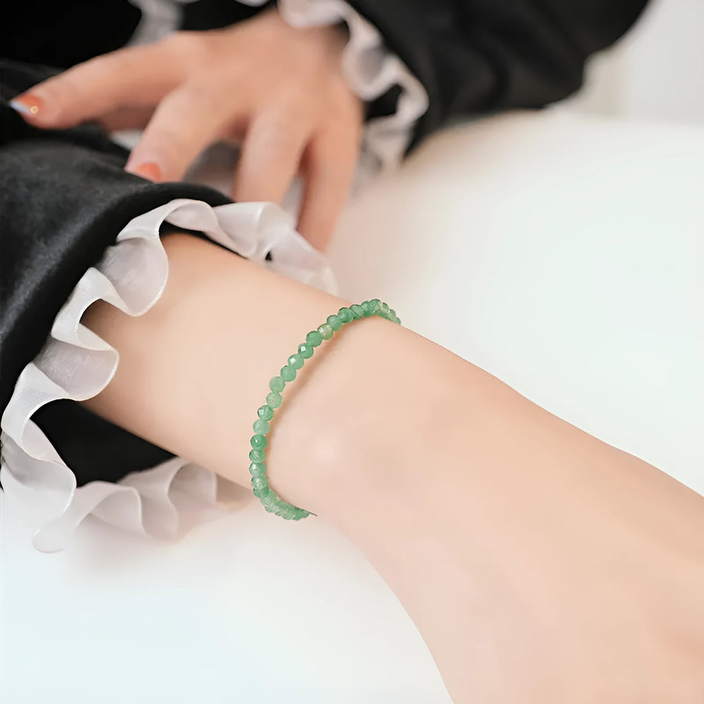 Handmade women's jade bracelet with 3mm beads in green aventurine, shown in 15cm length.