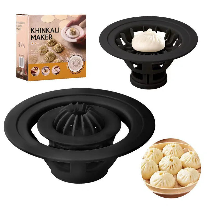 Four identical black plastic steamed bun moulds for making baozi and dumplings