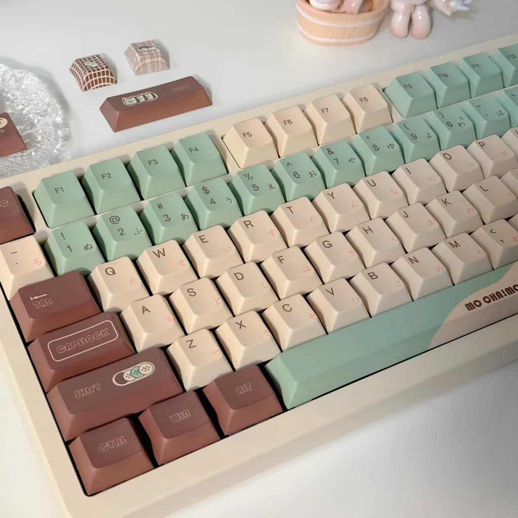 CAP Adaptive Cross Satellite Shaft mechanical keyboard keycap set in Matcha Theme colour with keycap puller.