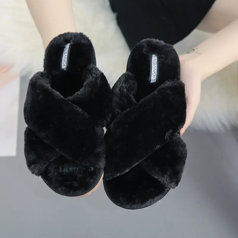 Women's cross open-toe fur slippers in assorted colours on a patterned non-slip sole.