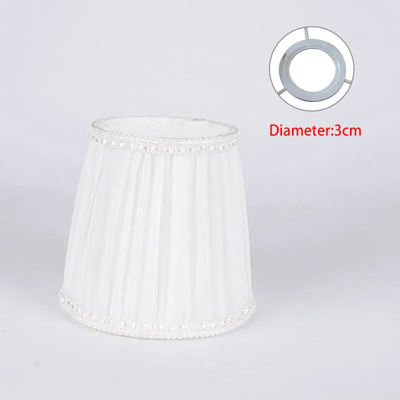 Fabric lampshade for crystal wall lamp in dark blue, white or black with bubble or pion pattern.