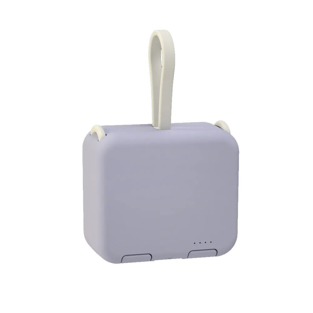 Handbag clip-on power bank in blue showing USB-A, Type-C and Lightning ports and built-in phone stand