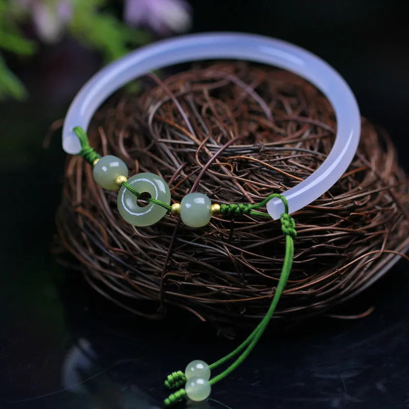 Handmade white agate half bracelet with peace buckle closure and hand-woven bead construction