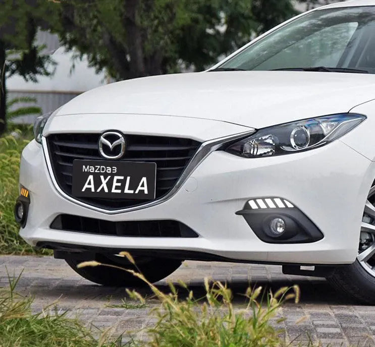 KUST Oncocela LED daytime running light with white and yellow streamer for 14-16 Mazda Enclave front view