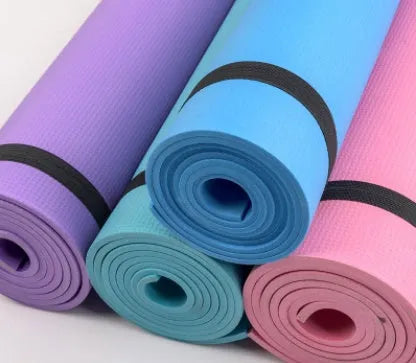 Red and blue EVA yoga mats showing 4mm and 6mm thickness options rolled up with storage bag.