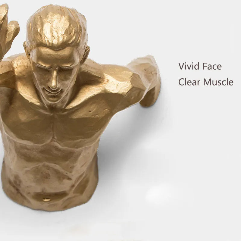 A modern, simple-style resin character sculpture for wall decoration, shown in a metallic finish.