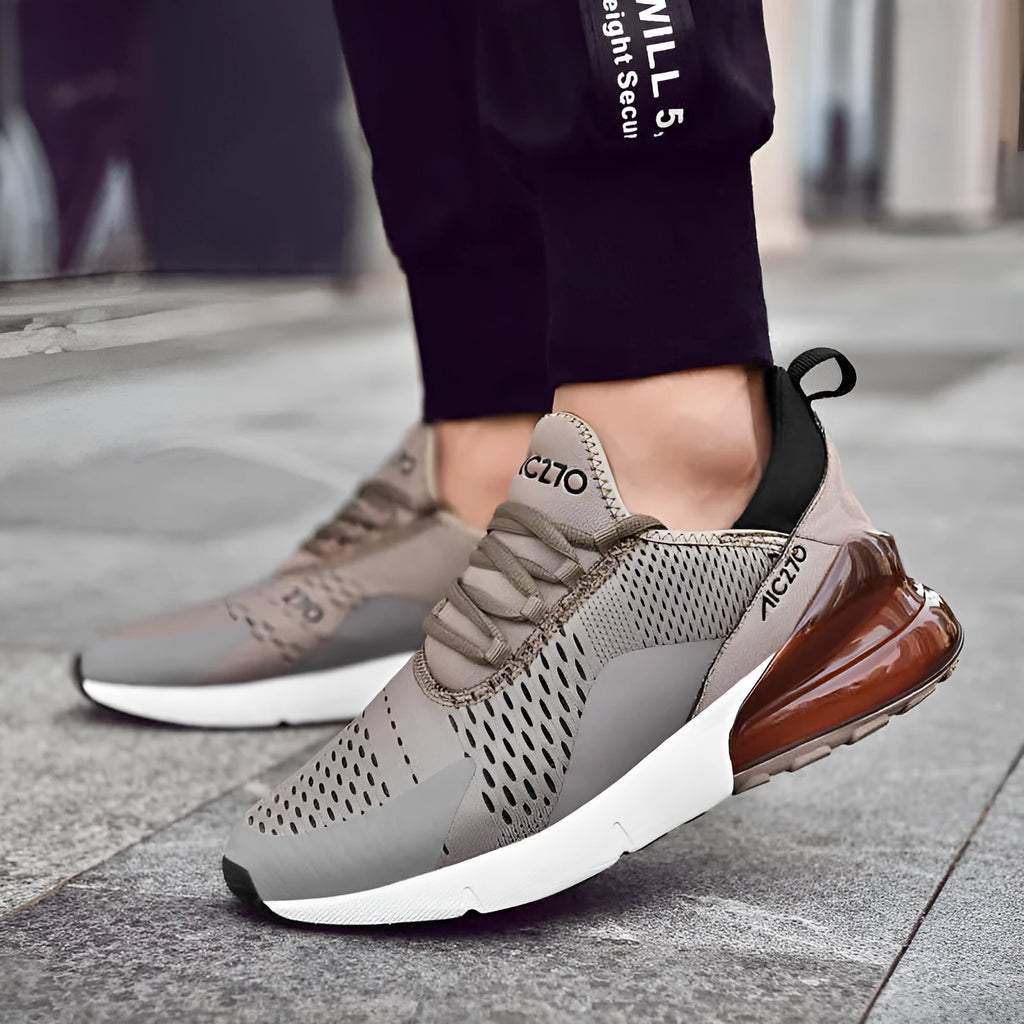 Men's mesh casual shoe with front strap, rubber sole, colour-blocked upper in black and red