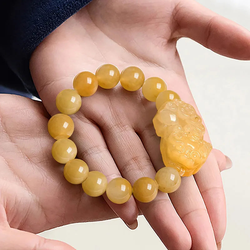 Carved Jinsi Jade Money bracelet showing large and small size options with measured jade beads.