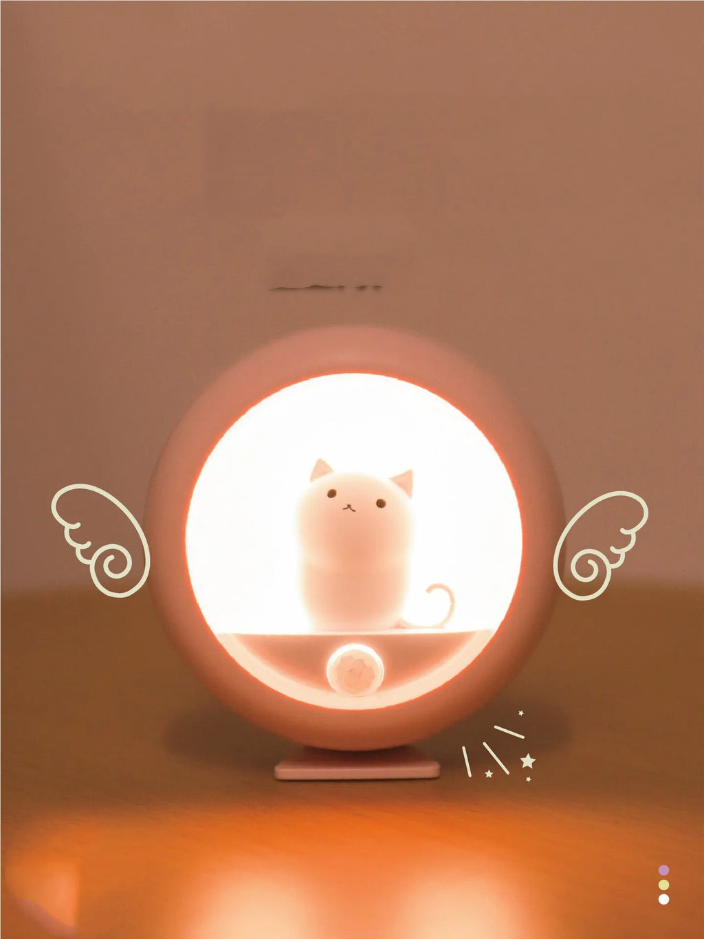 Baby bedside sleep lamp in orange, pink, and white colours with projection feature