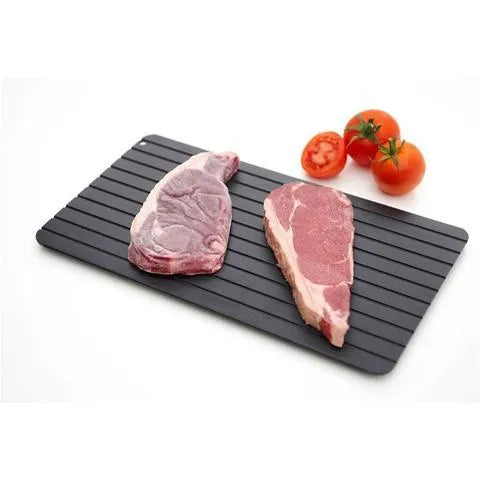 Black aluminium kitchen defrosting tray for thawing frozen meat and food without electricity