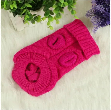 Knitted wool dog sweater with fabric buttons on a white background, shown in blue