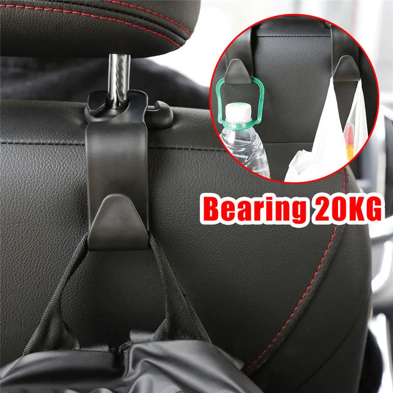 Set of four black PP plastic universal car seat back hooks on a car front seat backrest