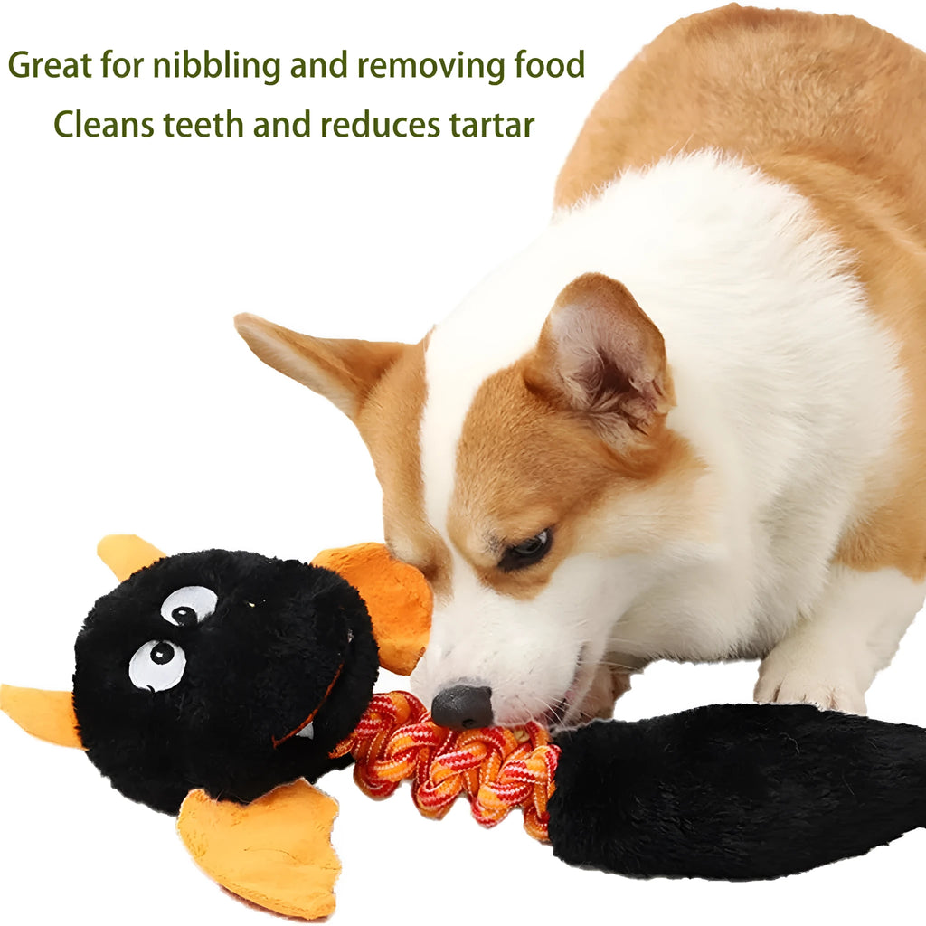 Large black plush dog toy with cartoon design, featuring a squeaker, rattle, and an elastic rope knot for chewing.