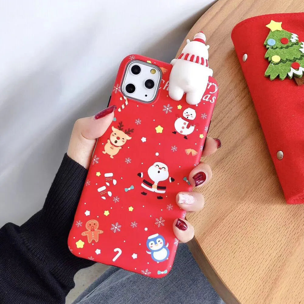 Christmas themed silicone back cover case for Apple iPhone on a festive background.