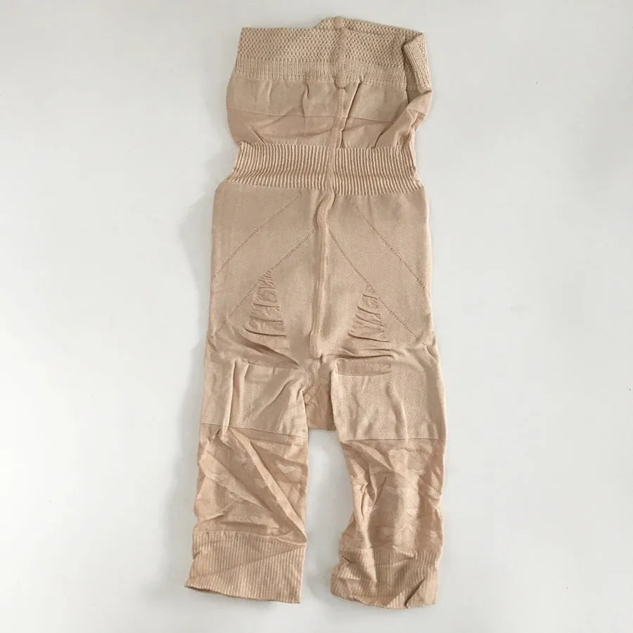 Women's black seamless high-waist shapewear shorts for tummy control.