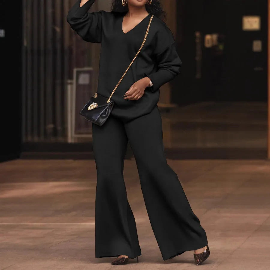 Women's brown thick suede velvet two-piece suit with split long sleeves and matching trousers.