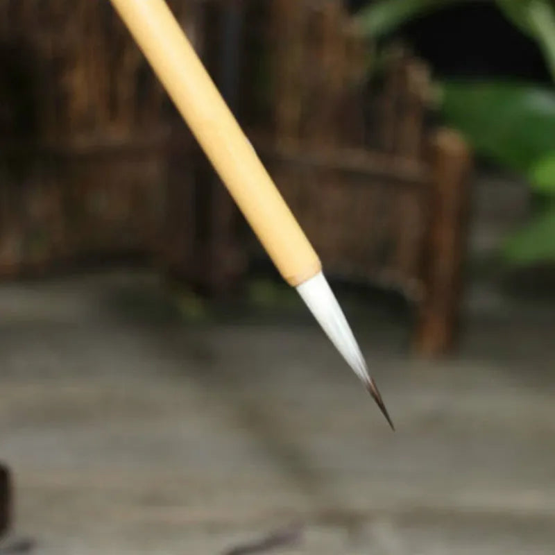 Traditional writing brush set with mixed hair construction and thin gold body design
