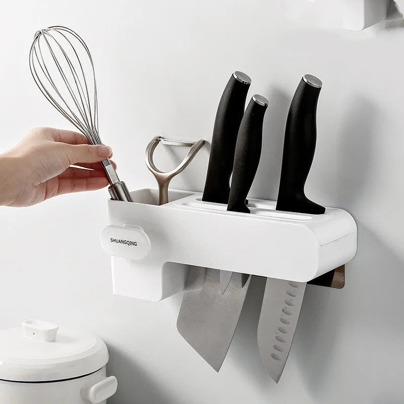 White plastic kitchen knife storage rack with compact dimensions on kitchen worktop