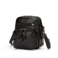 Soft PU leather mini shoulder bag with chain detail in black and brown colour options