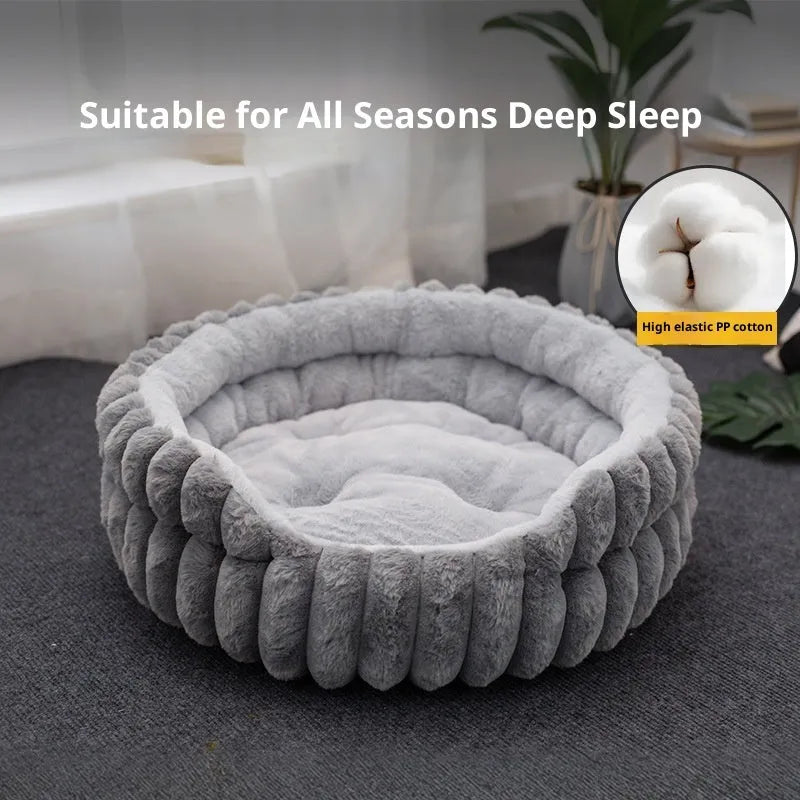 Round plush cat bed in grey, 50cm diameter, on a wooden floor