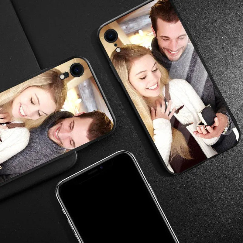 Slim patterned protective case for Apple iPhone with raised edges around screen and camera.