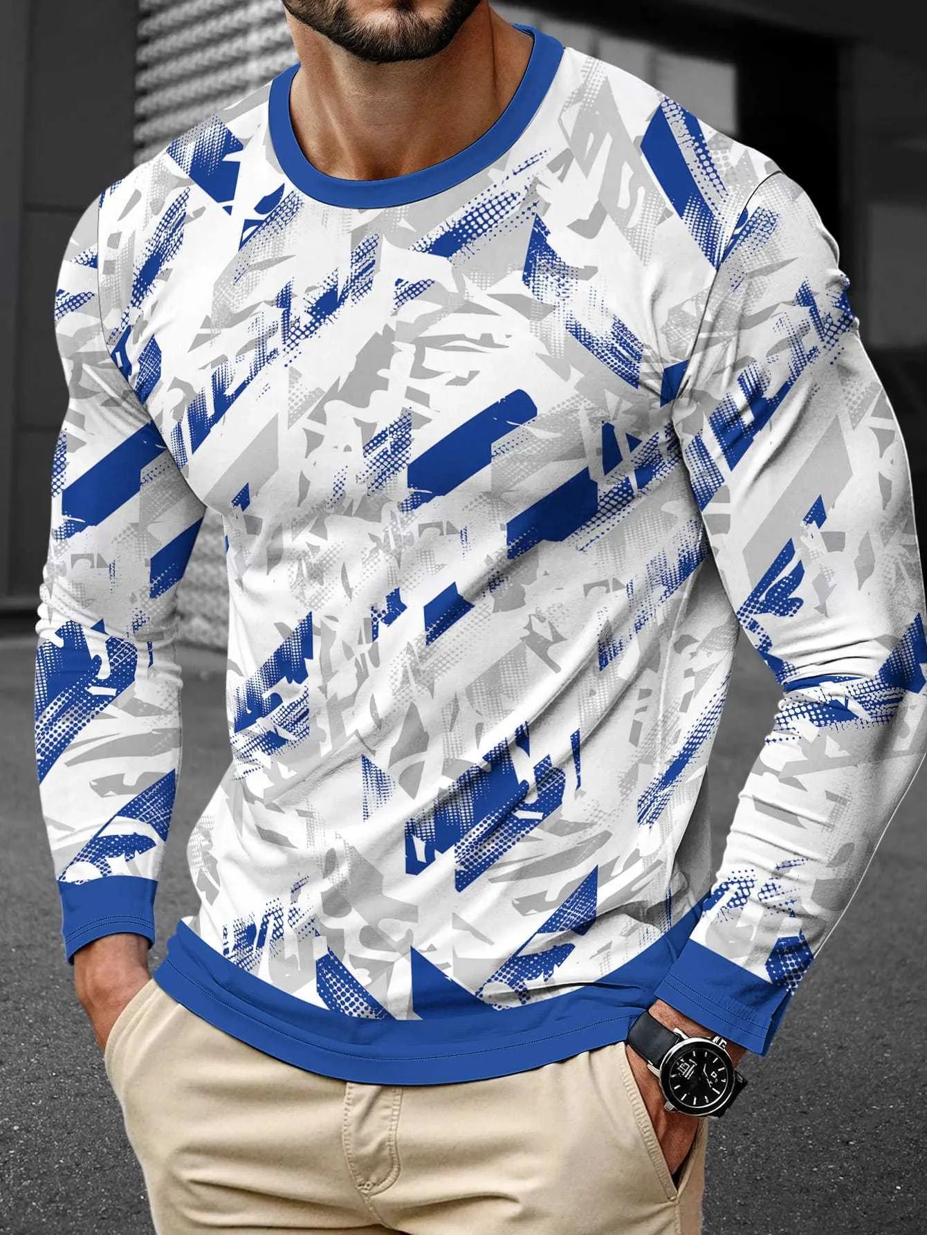 Man wearing a simple long sleeve round neck pullover top in milk silk fabric, available in multiple colours.