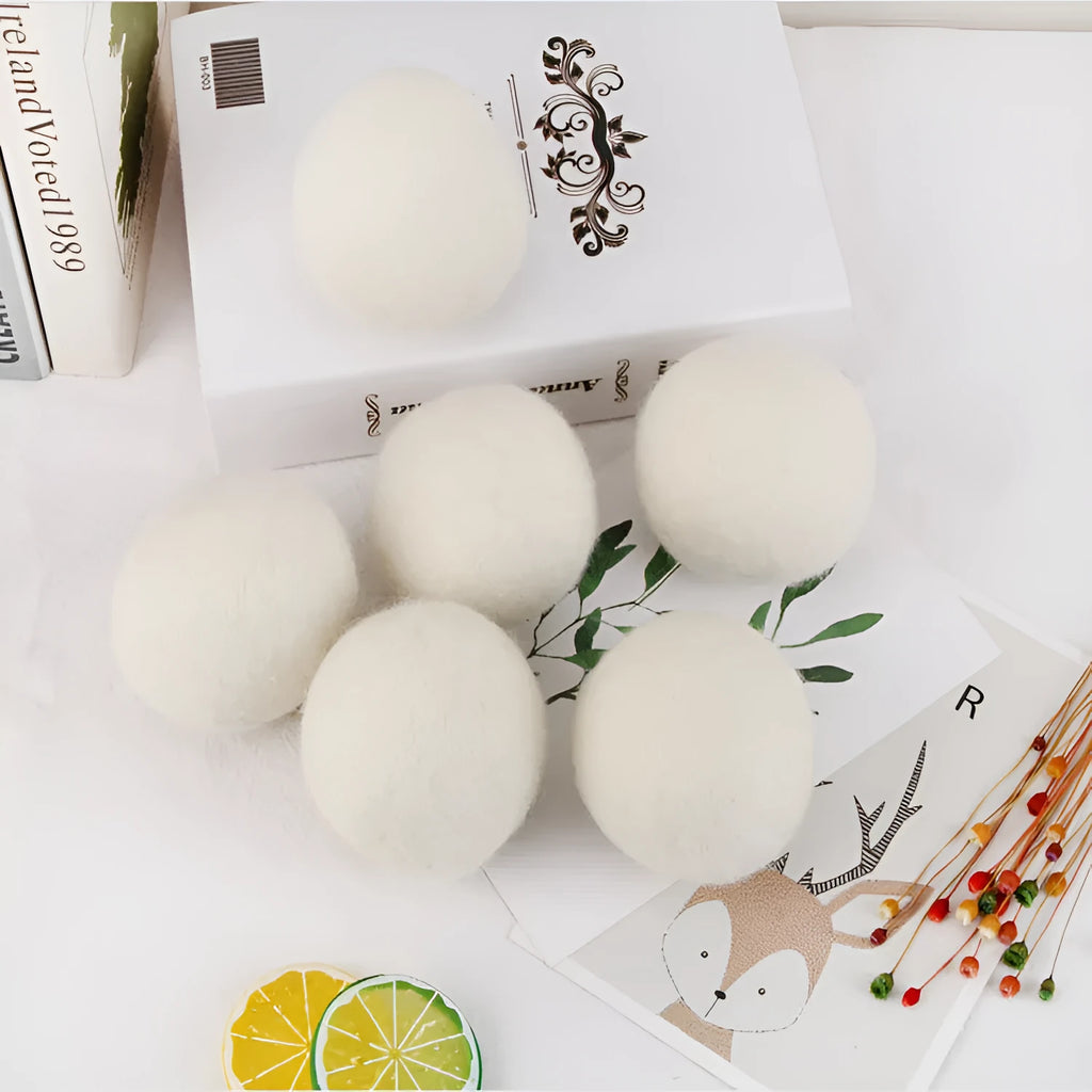Set of natural wool drying balls with cotton storage bag for laundry static reduction