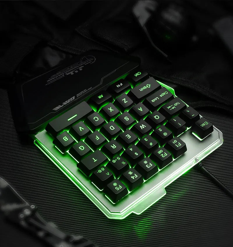 Black Robotic G40 one-handed mechanical keyboard with RGB backlit keys on a desk