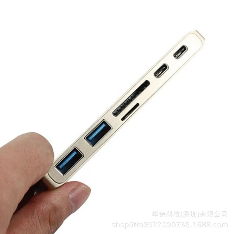 USB-C hub 109x33x10mm with dual Type-C, two USB 3.0 ports, SD and Micro SD slots, grey or silver