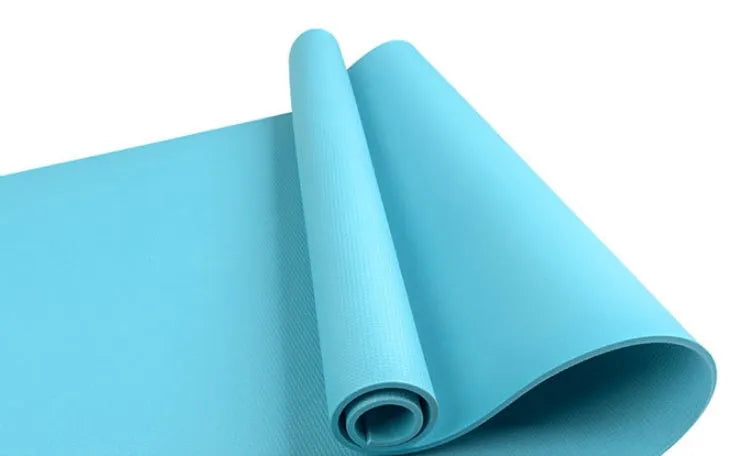 Red and blue EVA yoga mats showing 4mm and 6mm thickness options rolled up with storage bag.