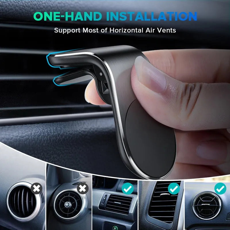Black car phone bracket mounted on a vehicle air vent, holding a mobile phone in landscape orientation.