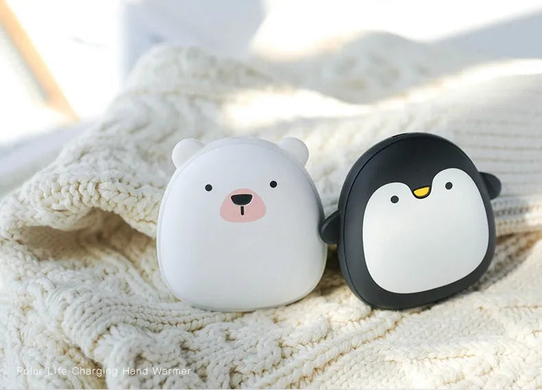 Cartoon penguin and polar bear design USB rechargeable hand warmer showing front and back.