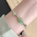 Green copper women's bracelet with peace buckle, jade double rings and animal zodiac ethnic design