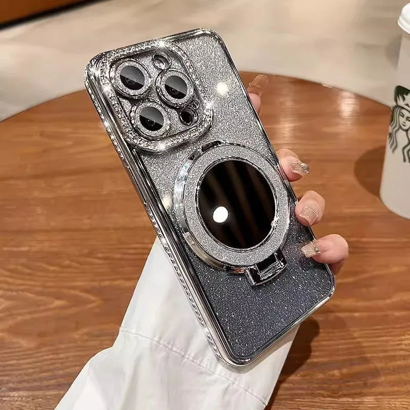 Gradient glitter phone case for iPhone with a built-in flip-out makeup mirror on a stand.