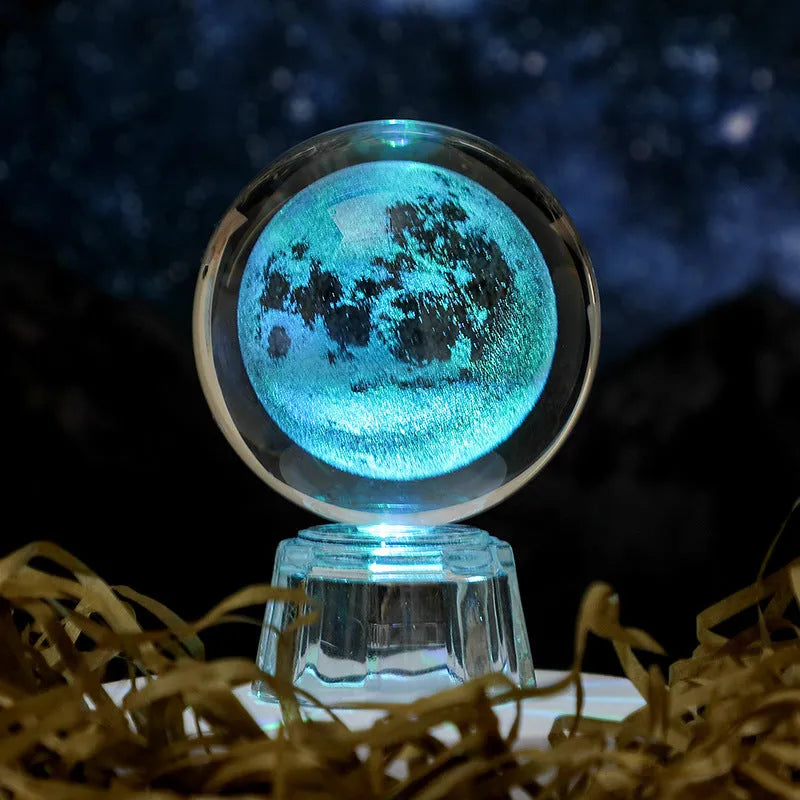 Transparent 6cm crystal ball ornament with inner carving on a fixed base, modern minimalist decor.