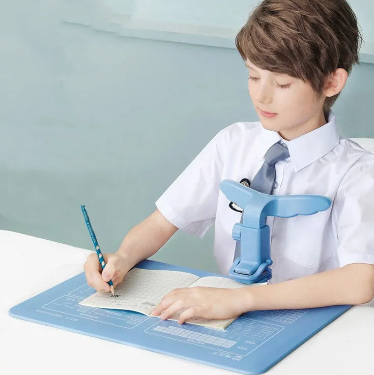 Student anti-myopia orthosis in blue silicone and ABS on a desk, seated posture bracket for corrective sitting
