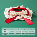 Hand-knitted Christmas cat collar in milk cotton yarn with festive bow design