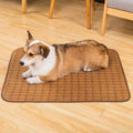 Brown woven rattan fibre dog cooling mat shown on a floor, available in multiple sizes.