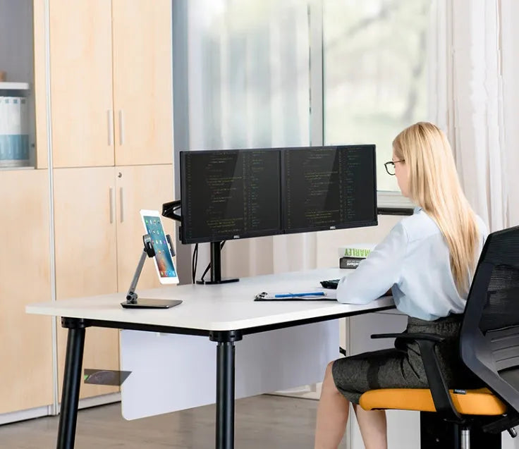 Silver foldable aluminium phone tablet holder on desk showing 360° rotation
