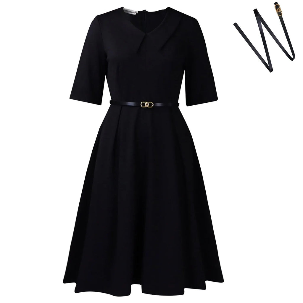 Women's solid colour African dress with half sleeves, high waist, and a matching belt.