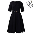 Women's solid colour African dress with half sleeves, high waist, and a matching belt.