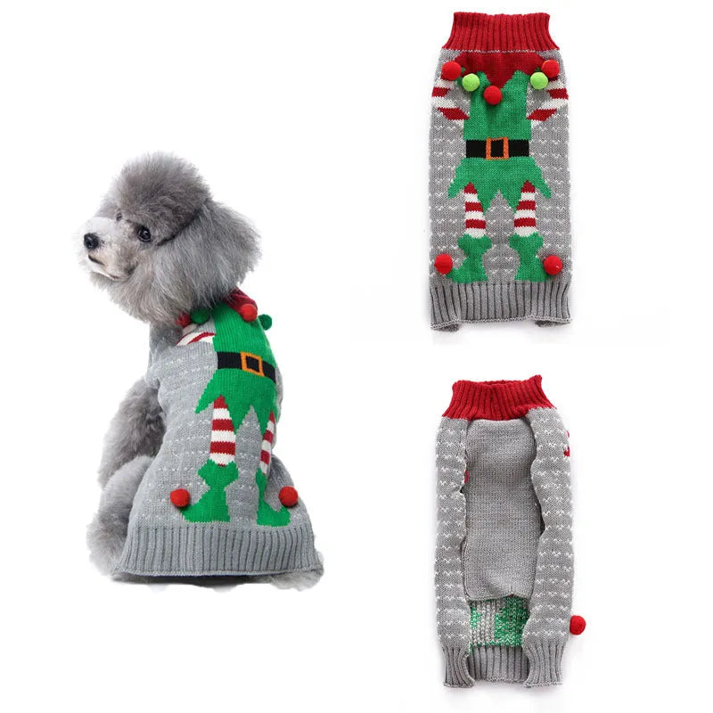 Small grey dog wearing a black Christmas sweater with white pompom and reindeer pattern