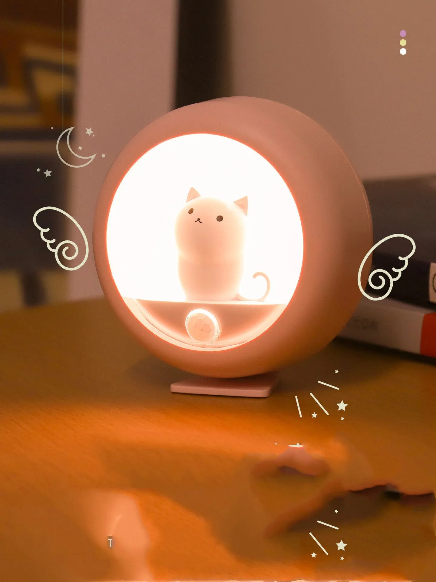 Baby bedside sleep lamp in orange, pink, and white colours with projection feature